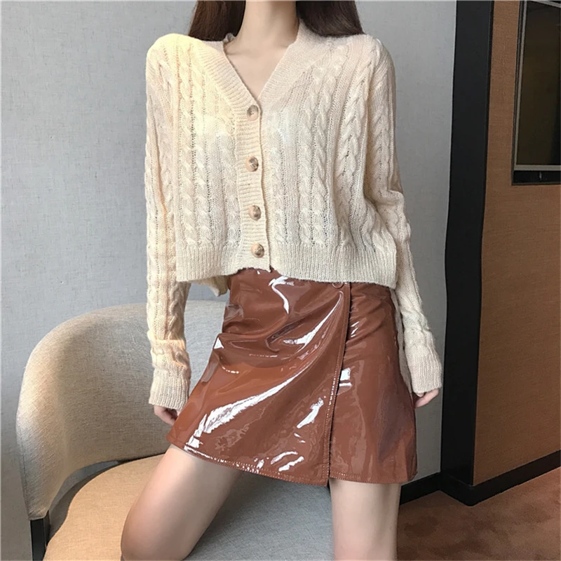 

HStar 2020 spring Women Short Skirt PU Leather Sexy Mini Skirt Ladies Casual A-line Button High Waist Women Clothing