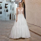 Пляжное свадебное платье на бретелях-спагетти, богемное кружевное платье в стиле бохо, свадебное платье с открытой спиной и V-образным вырезом, многоярусные свадебные платья