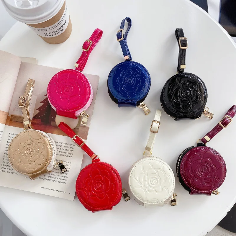 

Round Bright Leather Camellia Universal Headphone Bag for AirPods Samsung Huawei Xiaomi various types of Bluetooth headphones