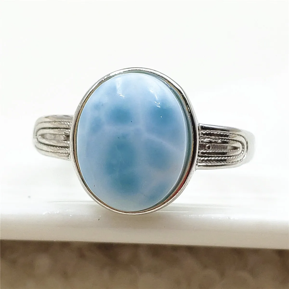 

Genuine Natural Larimar Blue Gemstone Adjustable Ring 12x10mm Dominia Water Pattern Oval 925 Sterling Silver AAAAAA