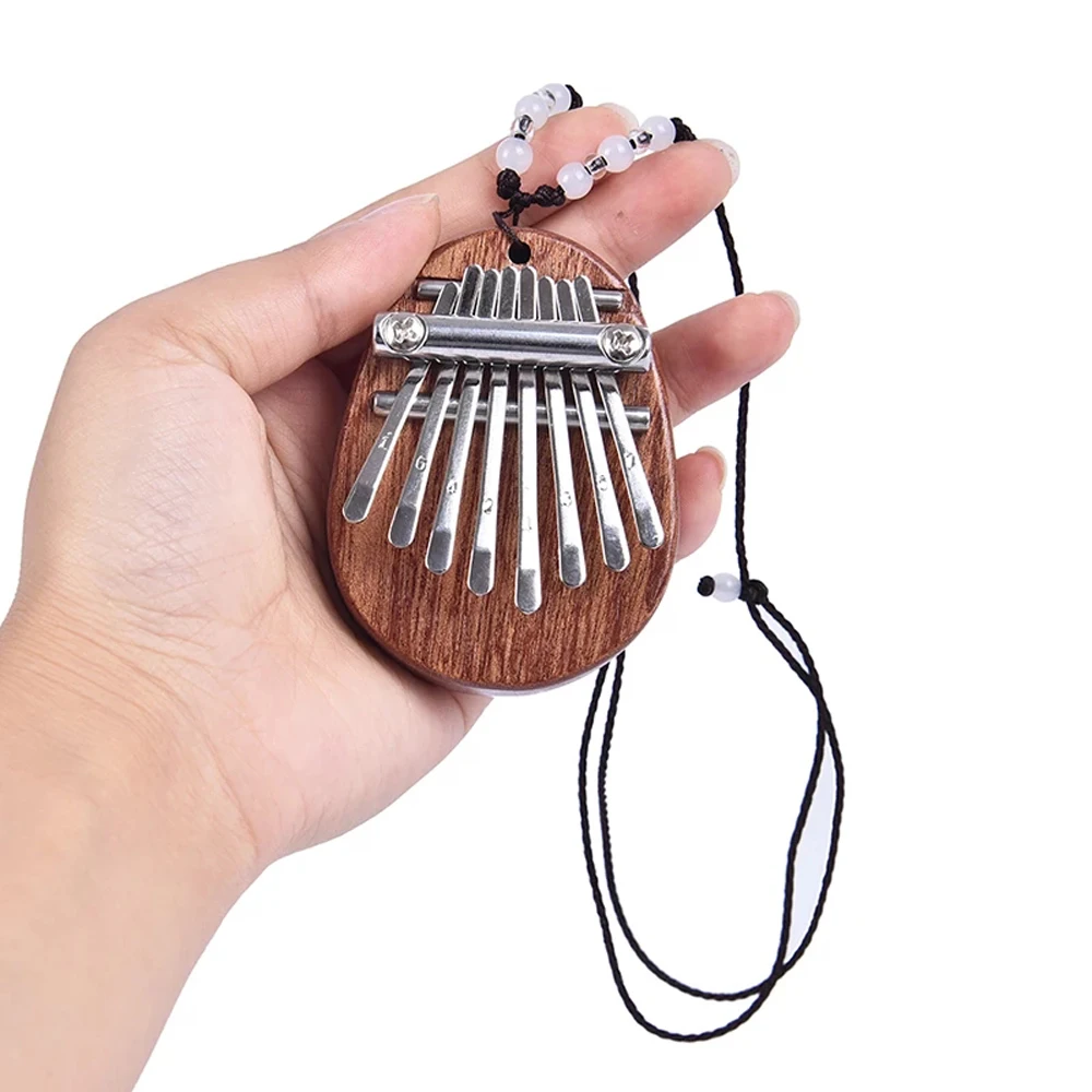 

Новейшее деревянное мини-пианино Kalimba, 8 клавиш, большой палец, отличный звук, клавиатура на палец, музыкальный инструмент с подвеской