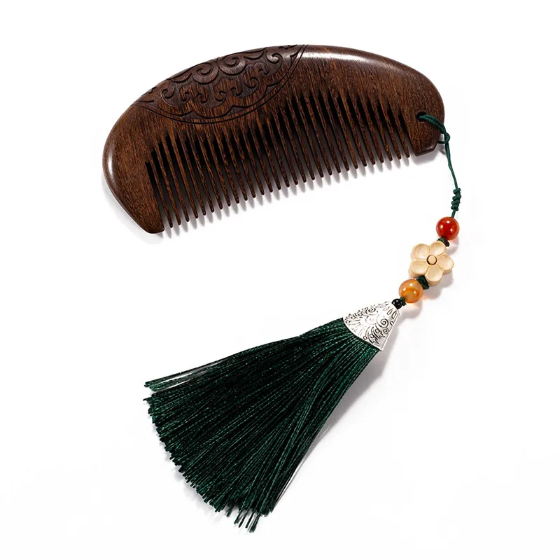 

Ebony comb for girlfriendMassage comb boxwood plum blossom with tassels