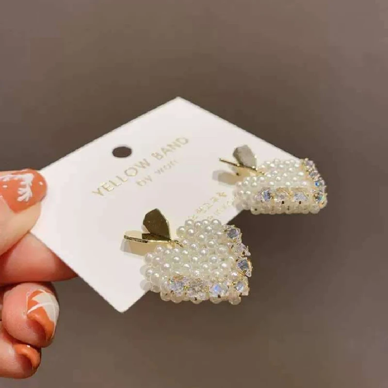 

Korean love pearl inlaid full turn S925 silver needle personalized earrings earrings fashion temperament