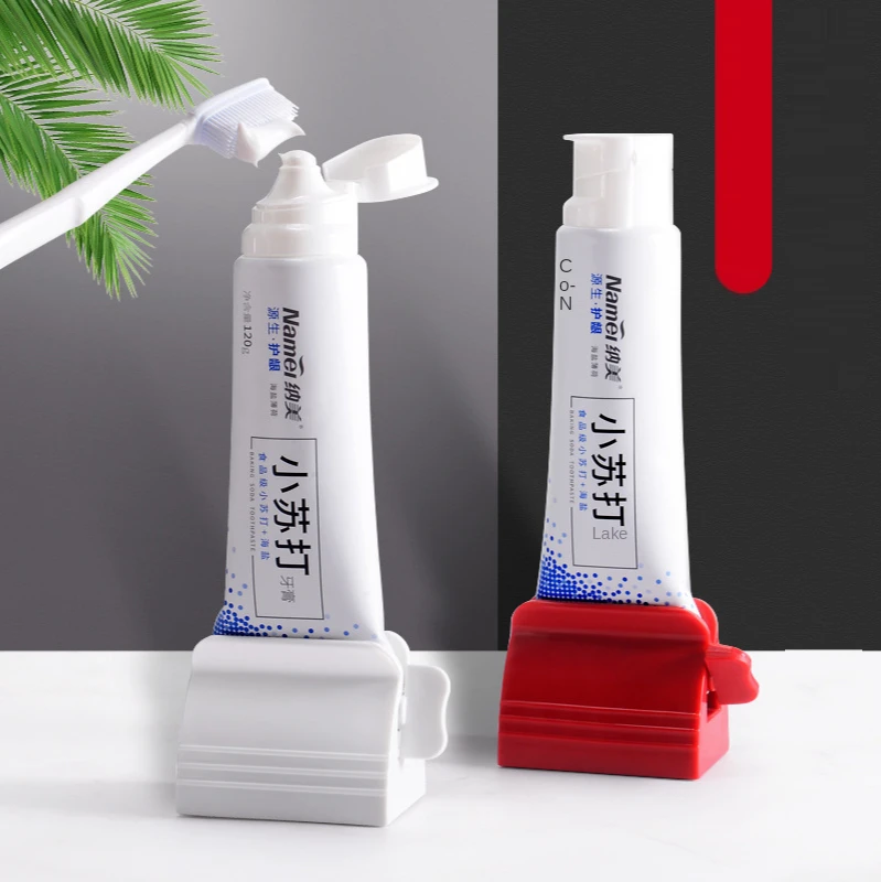 

Toothpaste squeezer Rolling bracket ToothpasteHolder Plastic Facial Cleanser Squeezer Press Bathroom Accessories