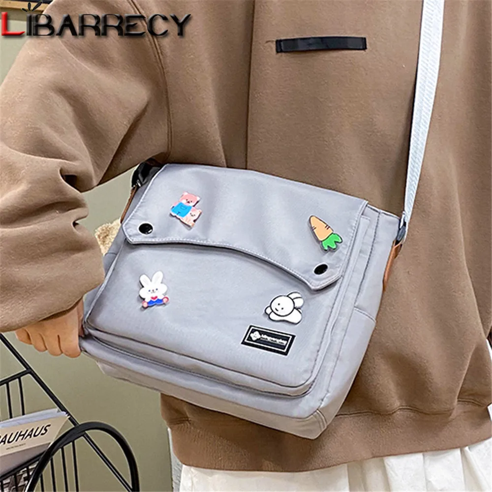 

Новая модная дизайнерская женская сумка с надписью, милая дизайнерская женская сумка через плечо с кулоном, Высококачественная нейлоновая ...