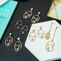 2020 new abstract stylish hollow out face dangle earrings fashion korean statement gold drop earrings for women party jewelry