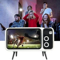 Держатель для смартфона с bluetooth колонкой, получается эдакий ретро телевизор, прикольно выглядит#1