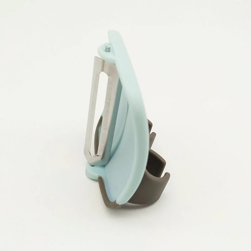 Новые творческие палец провел ладони очистки фруктов и овощей легко держать