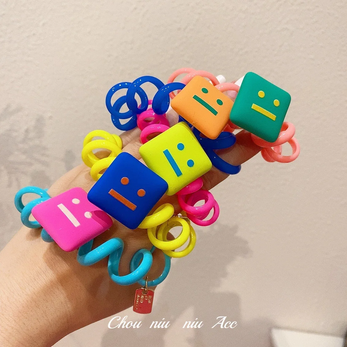 

Korean version of square frosted face smiling face color telephone line Candy-colored children adult rubber band hair rope girl