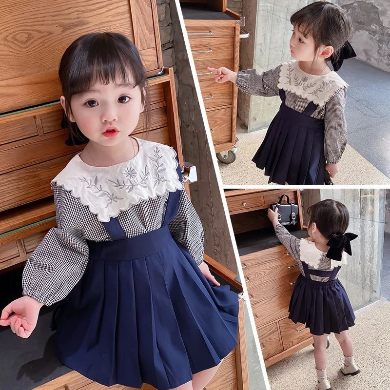 

2021 new spring and autumn girls plaid shirt strap skirt casual cute explosion two-piece suit
