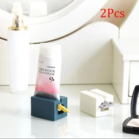 2pcs toothpaste squeeze dispensers bathroom accessories gadgets toothpaste holder sauce tube dispenser tools kitchen organizer