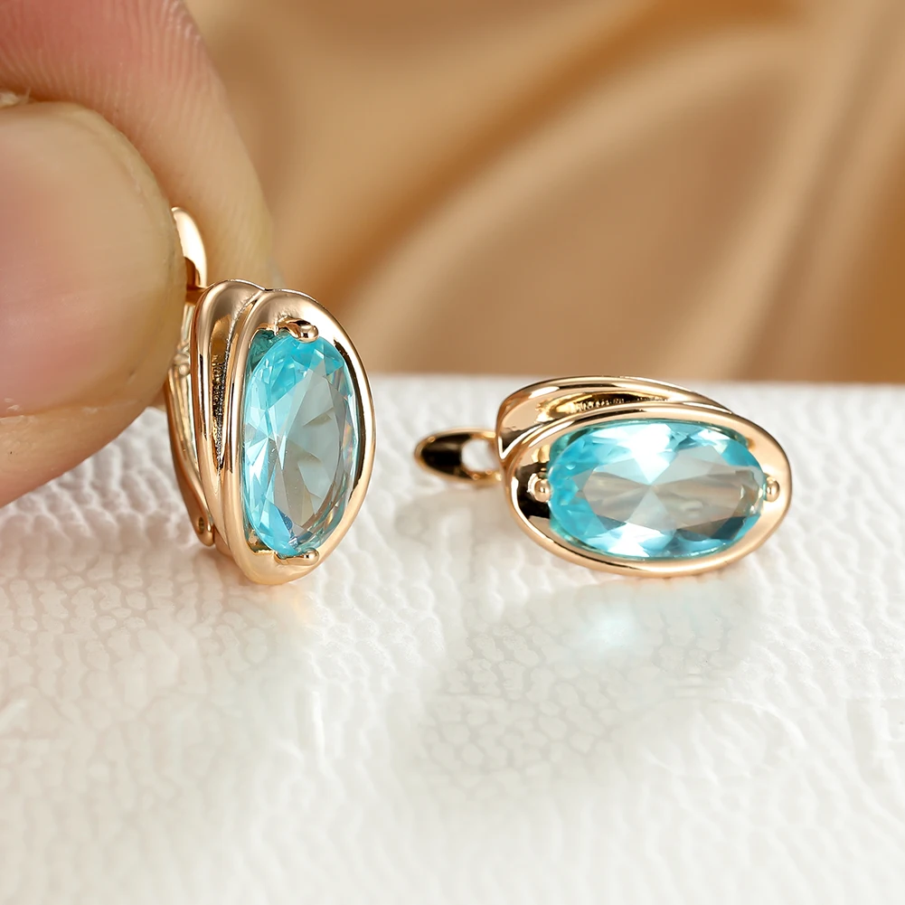 

Light Blue Gemstone Earrings for Women Temperament Gold Clip Earrings Oval Zircon Ear Studs Wedding Birthday Jewelry Gift