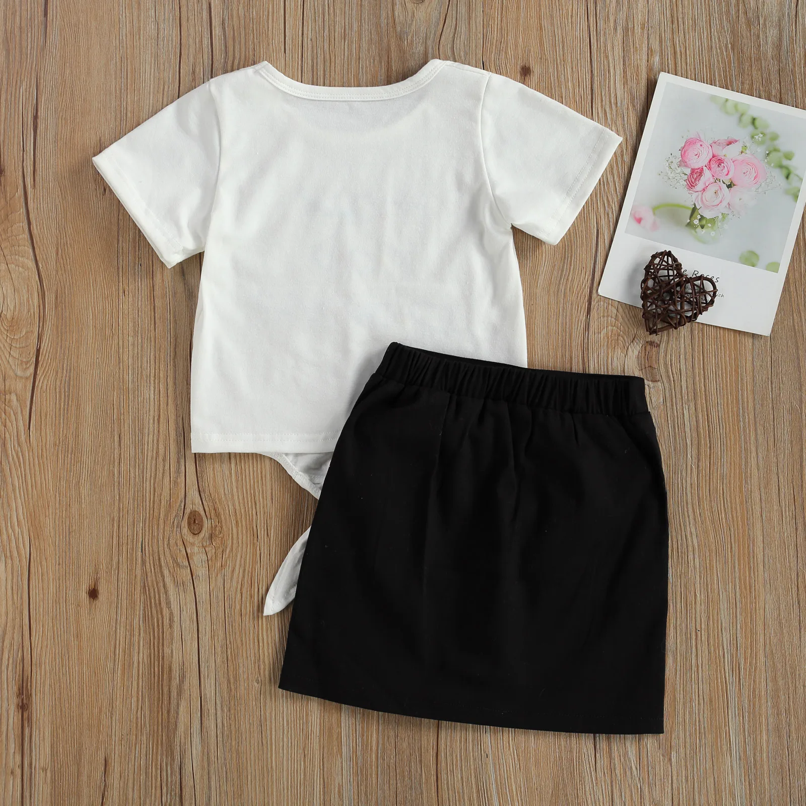 

Pudcoco 2021 Summer 2-7Y Baby Girl Flamingo /Letter Print 2Pcs Set Front Bow Short Sleeve T-shirt+Buttons Mini Skirt Clothes