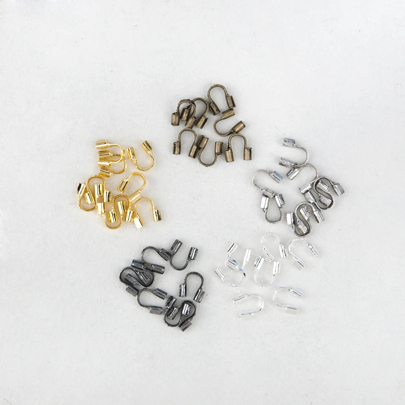

Doreenbeads 20 Pieces High Quality Wire Guardian Wire Protector Silver Color Copper Charms For Jewelry Making 5x5mm Hole:1mm
