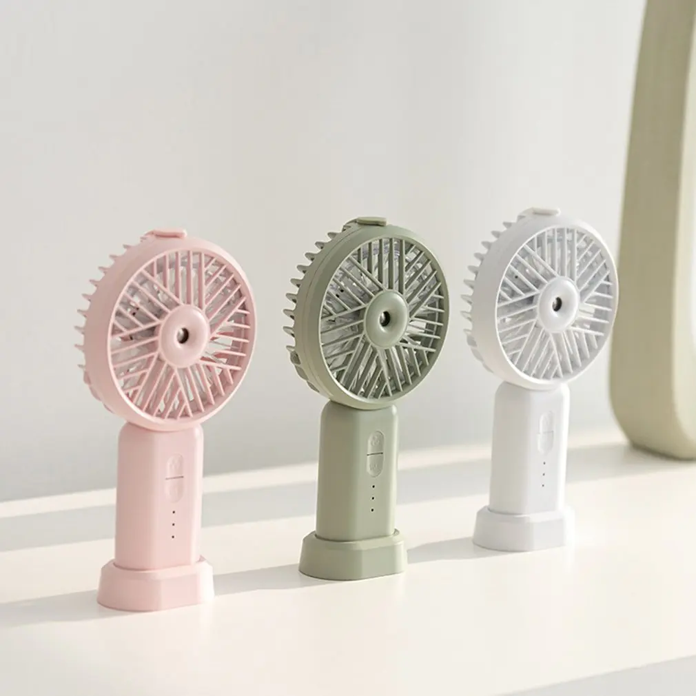 

Mini replenishment fan USB charging handheld portable humidification electric fan desktop spray small fan