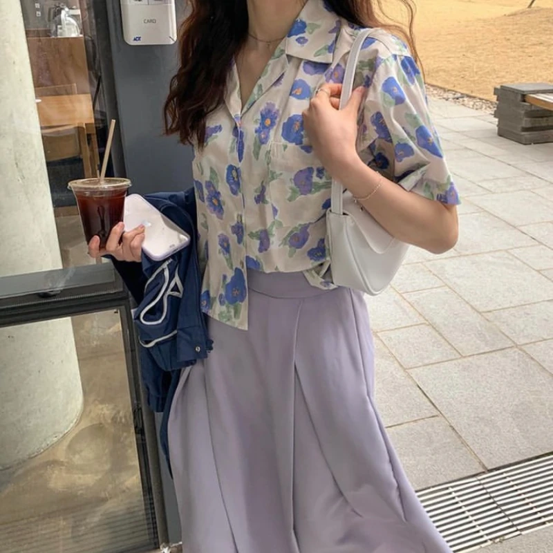 

Kimtoimo Korean Two Piece Sets 2021 Summer Print Turn-down Collar Loose Short Sleeve Shirt + Empire Creasing Long Skirts Sets