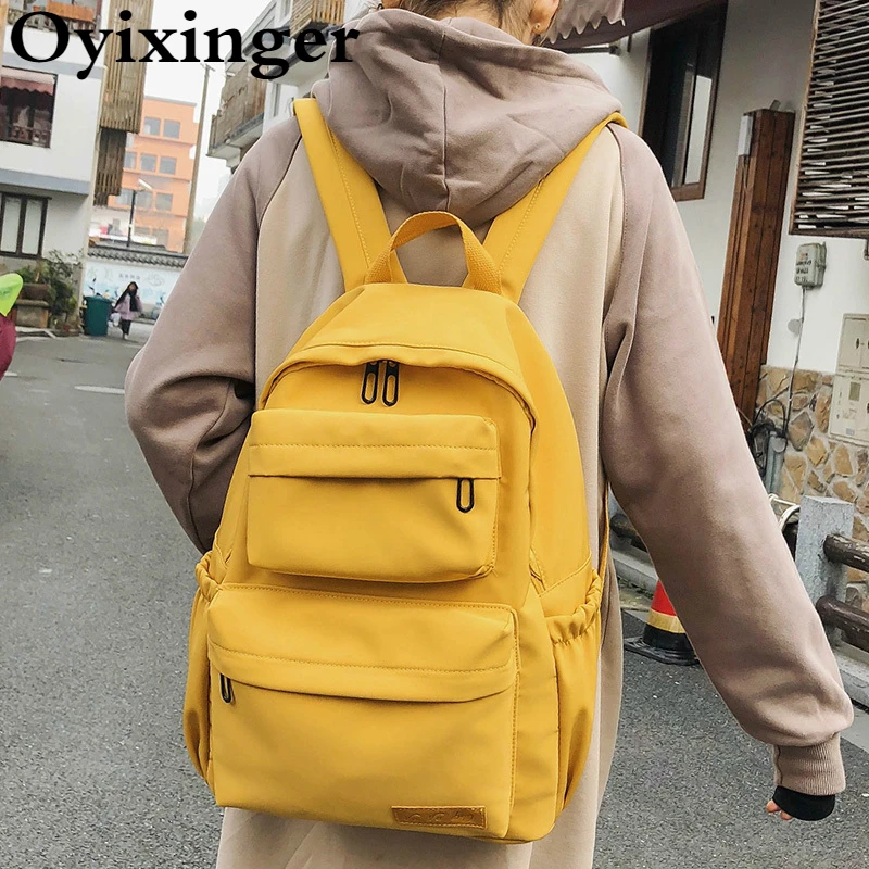

OYIXINGER Waterproof Nylon School Bags 2021 New Multiple Pocket Travel Schoolbag Female Large Capacity Backpack For Teenage Girl