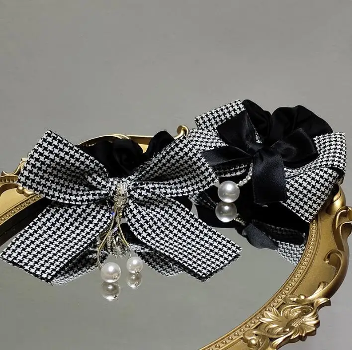

Korean temperament black and white bow tassel hair ring retro diamond elegant hair rope rubber band headdress