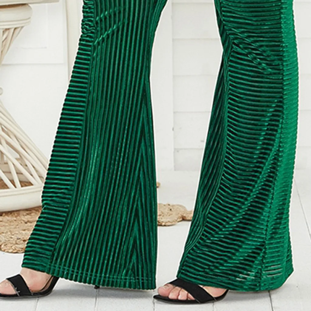 Зеленые винтажные расклешенные брюки женские осенне зимние размера плюс