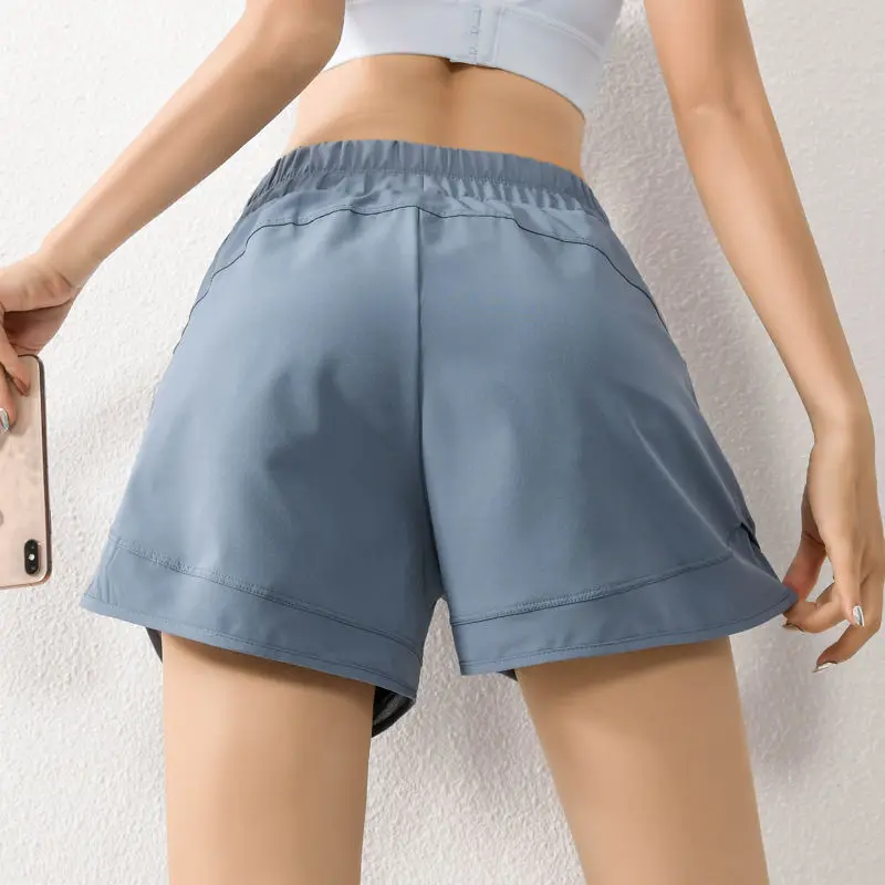 

Sports shorts women's summer loose lined mesh stitching pocket running pants fitness hot pants Yoga Capris