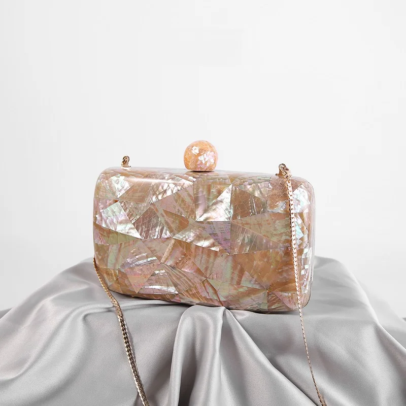 

Philippines imported natural shells hand-polished high-end texture clutch bag first-class distinguished shell bag