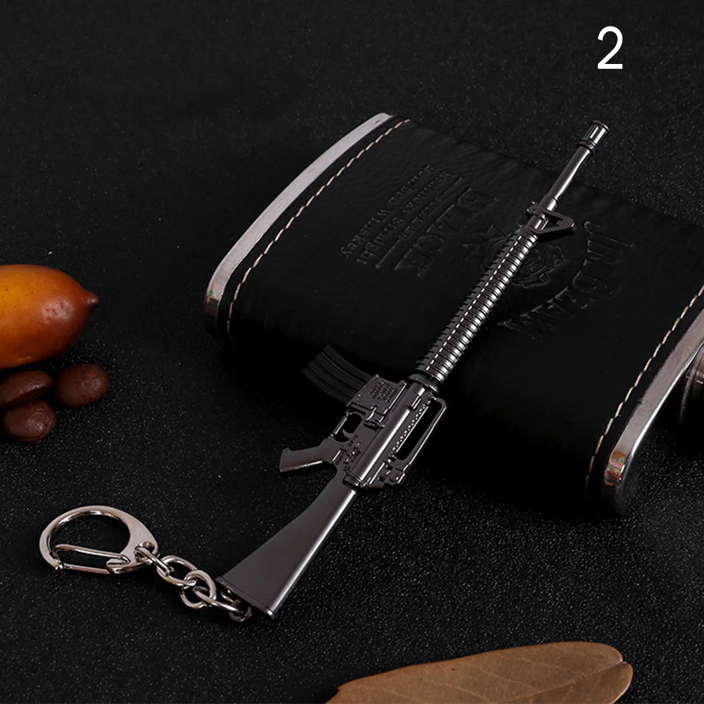 

Hot Sale Game M16 Novelty Items AK47 Men Guns Keychain pendant Trinket M4A1 Sniper Key Chain 10 styles Jewelry Souvenirs Gift
