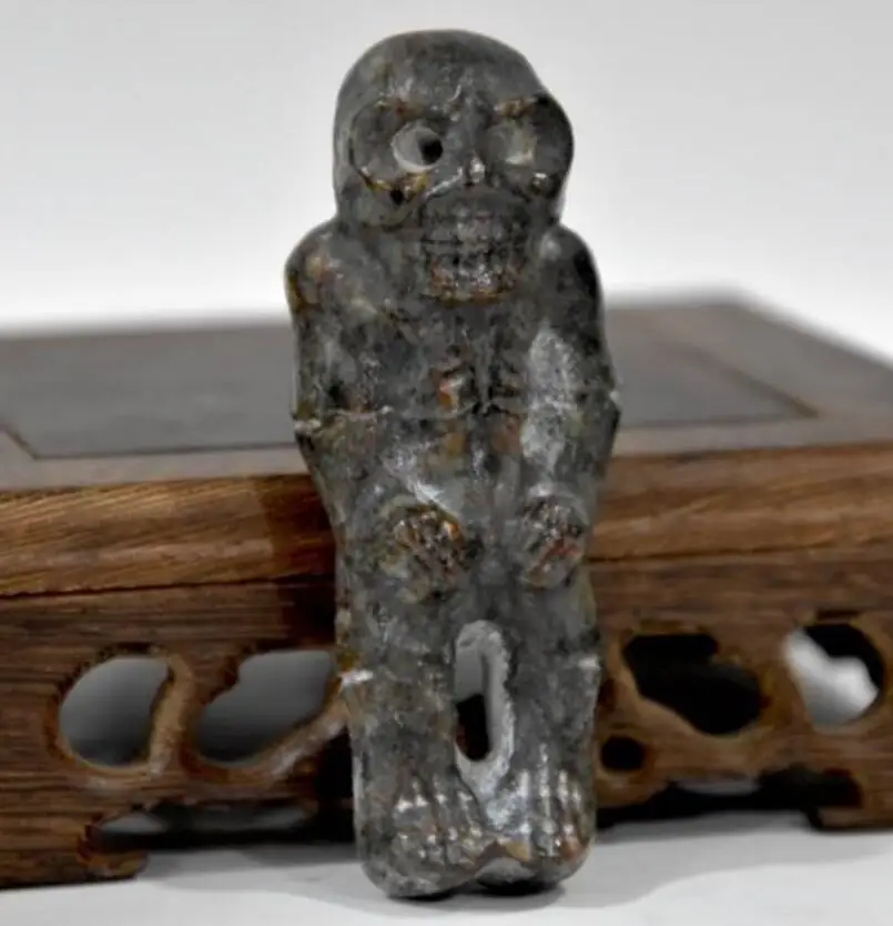 

Хуншанская культура архаизированная черная железная статуя скелета метеорита