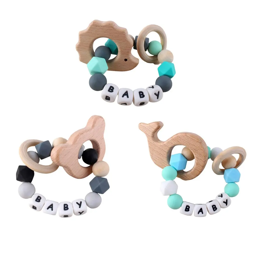 

Grasping Activity Shaker Bracelet Teether Ring Chew Bracelet With Natural Organic Beech Wood Teething Rings