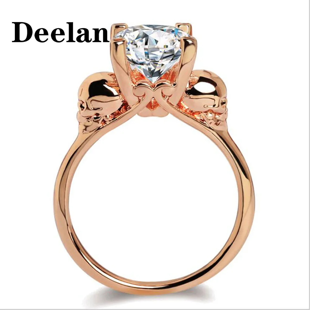 Женское кольцо с черепом цвета розового золота белым кристаллом из циркония