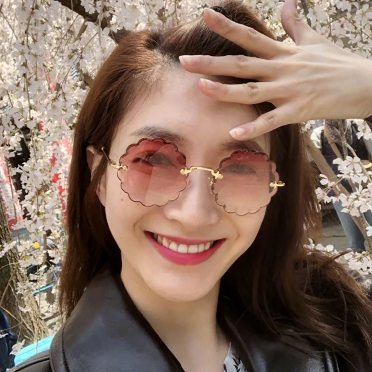 

Круглые металлические солнцезащитные очки в стиле ретро с цветами для женщин и мужчин, солнцезащитные очки без оправы для женщин 2020, роскош...