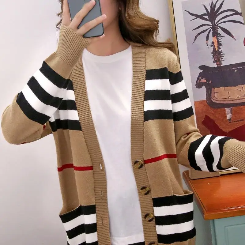 

2021 Spring And Autumn New Knitted Cardigan Women Korean Version Loose Wild Sweater Pure Color Jacket Top