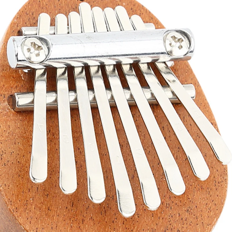 

8 Key Mini Kalimba Thumb Piano Exquisite Finger Marimba Pocket Thumb Piano Musical Accessory Pendant Gift