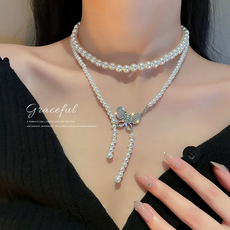 

Korea Dongdamen Net Red Temperament Freshwater Pearl Tassel Diamond Inlaid Butterfly Double-layer Clavicle Chain Neck