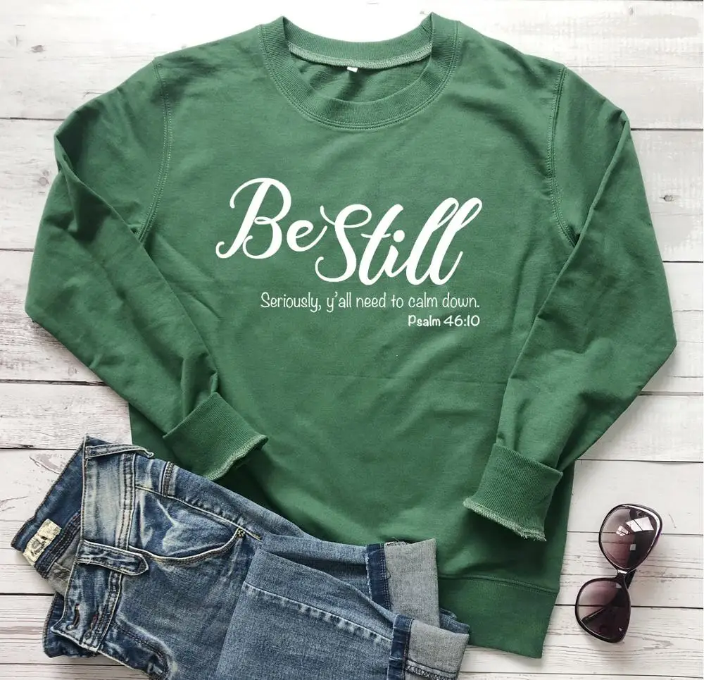 

Женский свитшот с надписью «Be Still»