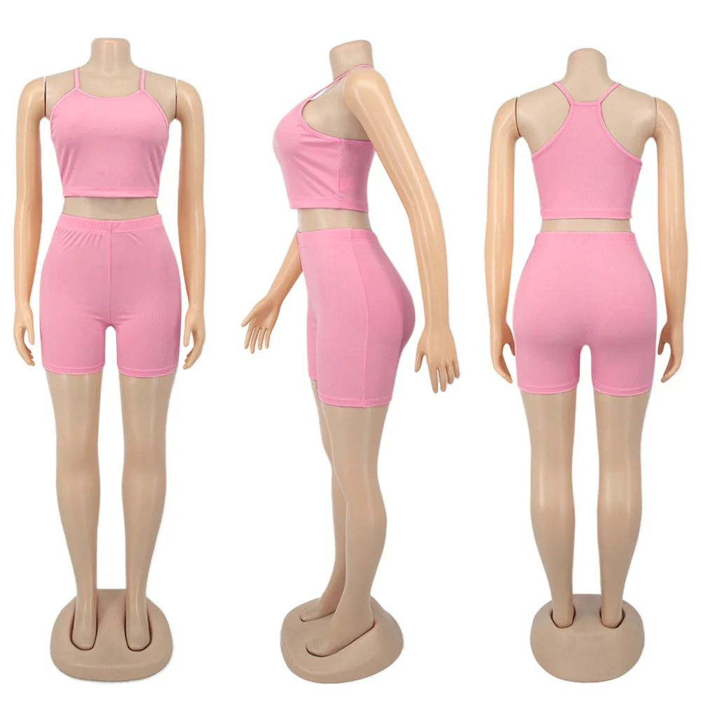 

2021 spring new fashion solid color leisure sports two piece slim o-neck sleeveless vest and shorts women's suit