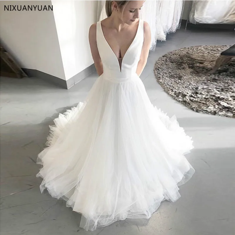

Custom Made Wedding Dresses Deep V-neck Sleeveless Bridal Dresses Satin Tulle White Ivory Wedding Gowns