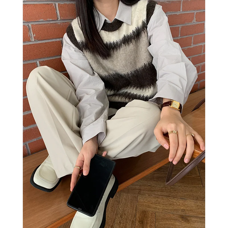 

The mind new winter sleeveless wool vest Korean loose stripe bottomed sweater female 91196