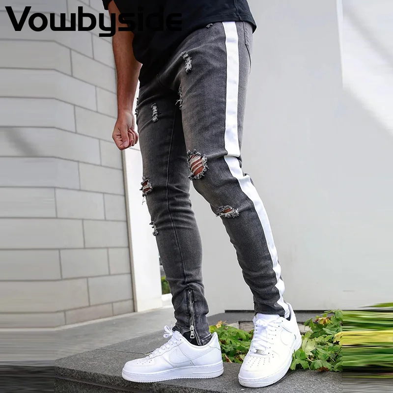 Брюки мужские рваные на молнии шикарные облегающие джинсы с полосками сбоку
