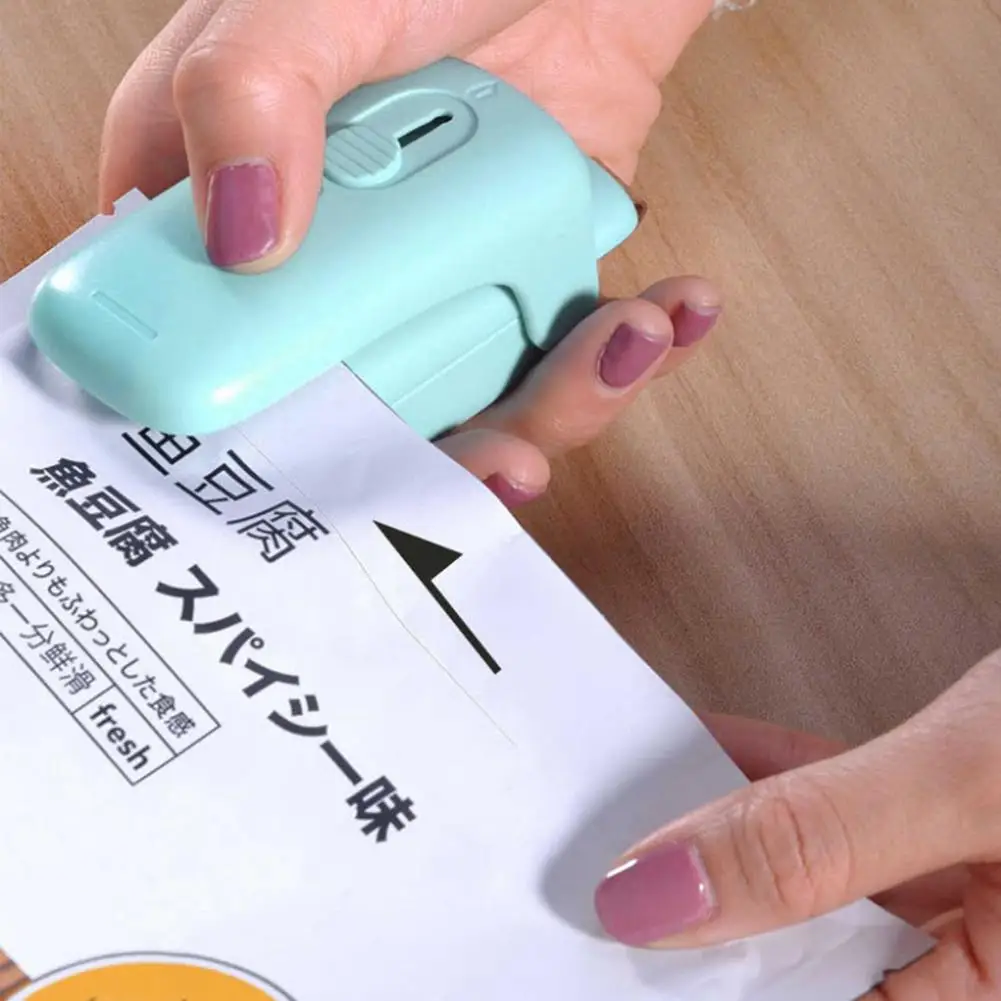 

Kitchen Sealer Portable Household Quick-sealing Sealer Small Express Food Packaging Bag Hand Pressure Sliding Lid Sealer