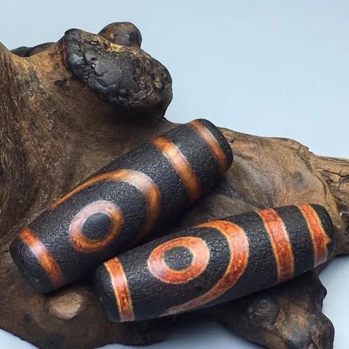 

Agate and Chalcedony A Pair of Tibetan Sun and Moon Weathered Dzi Beads Pendant Necklace