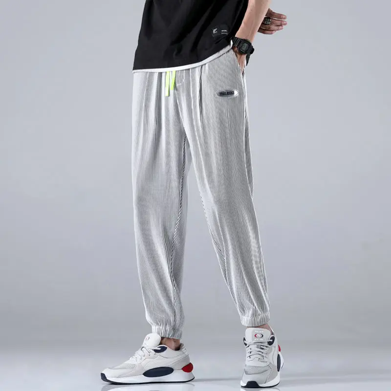 

20 Summer Thin Ice Silk Casual Pants Men's Trend Leggings Loose Size Breathable Fashion Brand Fast Dry Fashion Hot Running Pants