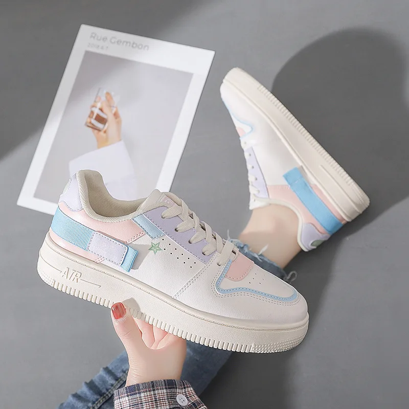The new spring 2021 white shoe female ins tide color matching han edition breathable leisure sport light and comfortable shoe