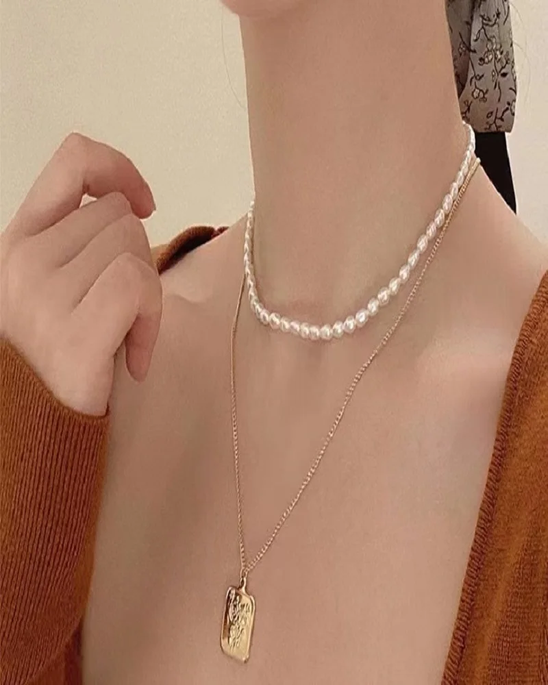 

Колье до ключиц жемчужная цепочка 38 + 5 см, можно отрегулировать по желанию 4-5 мм, натуральные высококачественные рисовые жемчужины, простые ...