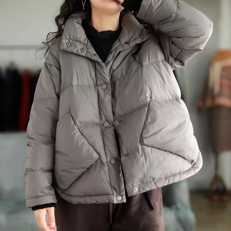 Loose White Duck Down Light Down Jackets Women Overcoat 2023 Winter New Korean Style Literary Lapel Asymmetric Pocket Warm Coats