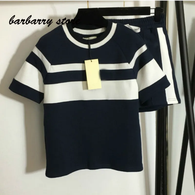 

2021 luxury brand color matching fashion women's versatile round neck loose short sleeve T-shirt + high waist elastic Shorts Set
