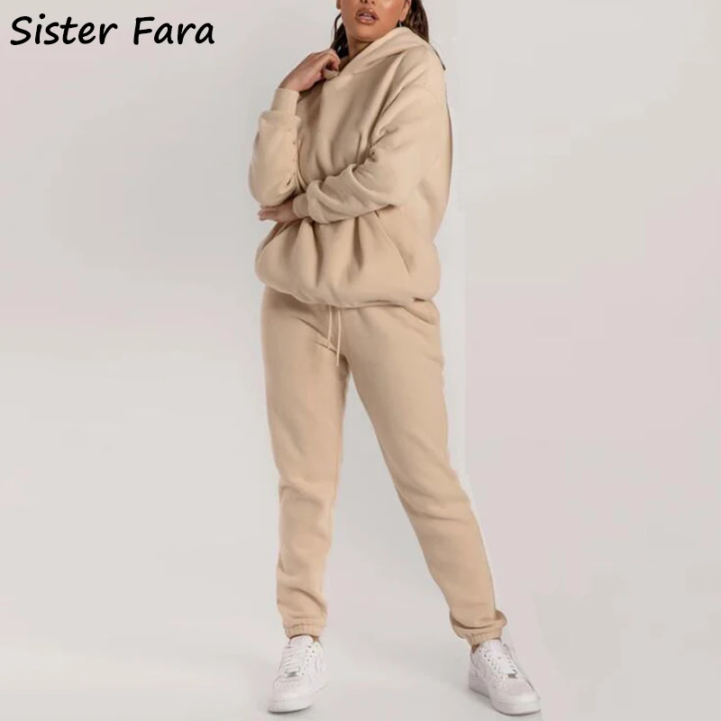 Костюм женский из двух предметов свитер с капюшоном и брюки-карандаш эластичным