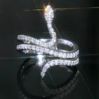 Кольцо женское в виде змеи, серебристого цвета с фианитами