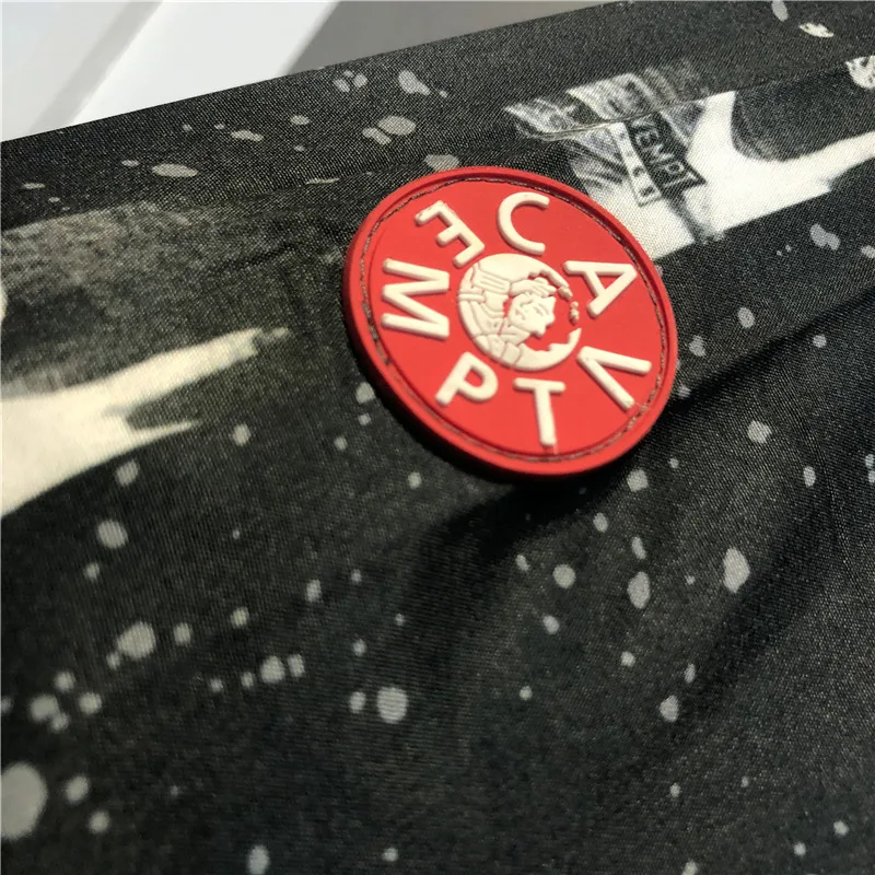 

Woman Face CAVEMPT C.E Shirt Japanese Street Retro Ghost Hand Full Printing Top Cav Empt Shirts