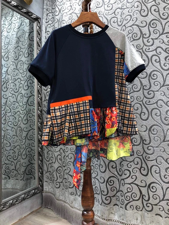 

2021 early spring new women's round neck color matching stitching irregular decoration ruffle short-sleeved top 107