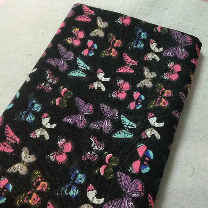 Довольно толстый черный красочными бабочками и бантиками с напечатаным холстом